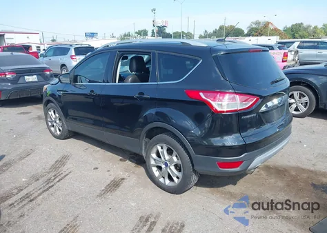 2015 Ford Escape Titanium z USA, uszkodzony, nr VIN 1FMCU0J99FUB93177